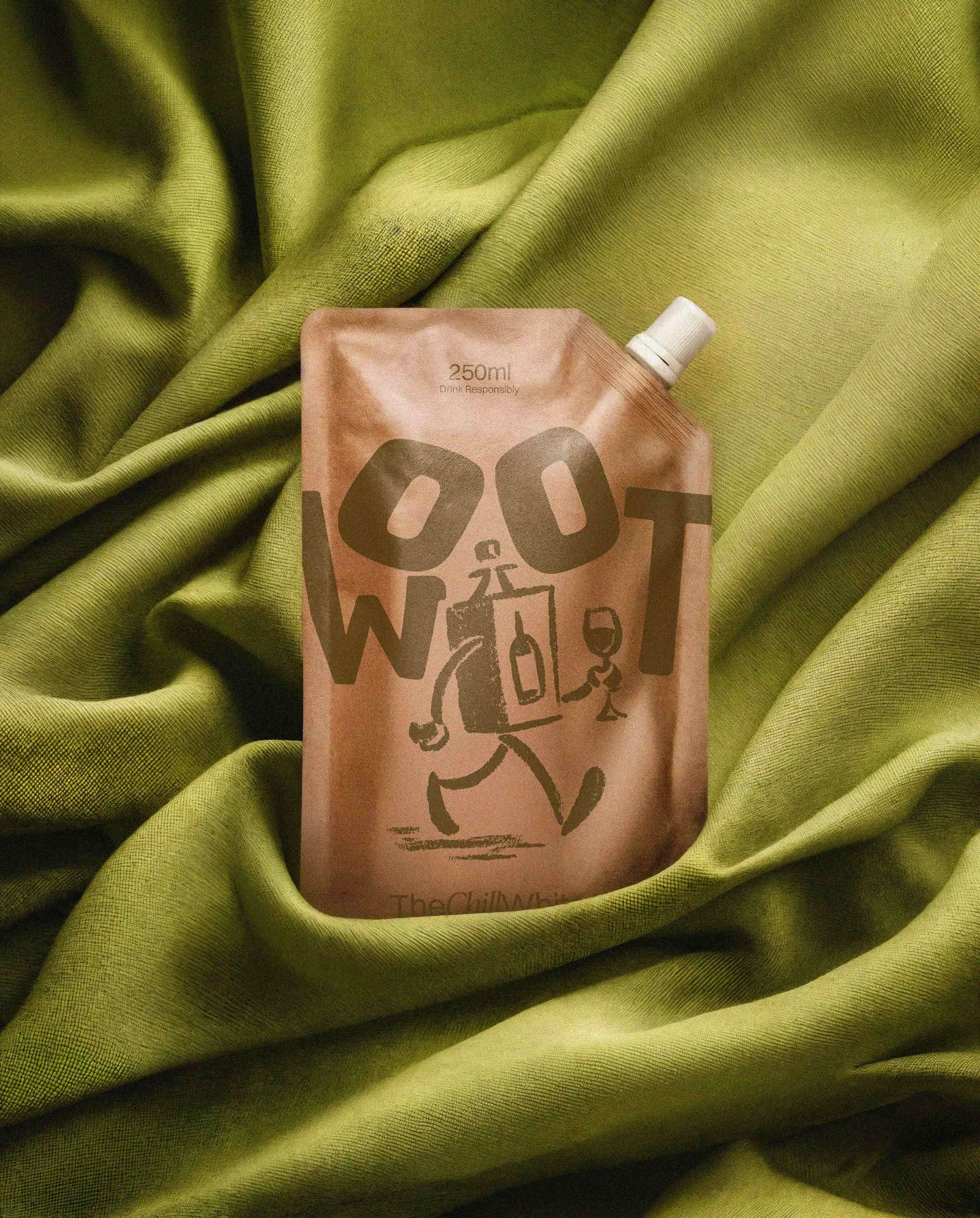 The Chill White WOOT kraft pouch resting on olive green fabric